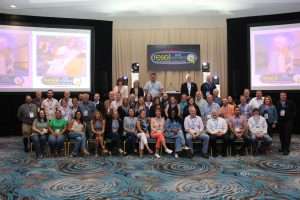 Team members celebrating 5, 10, 15, 20, and 25 years of service gather for a group photo.