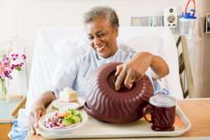 Patient enjoying lunch in the hosptial. Metz Culinary